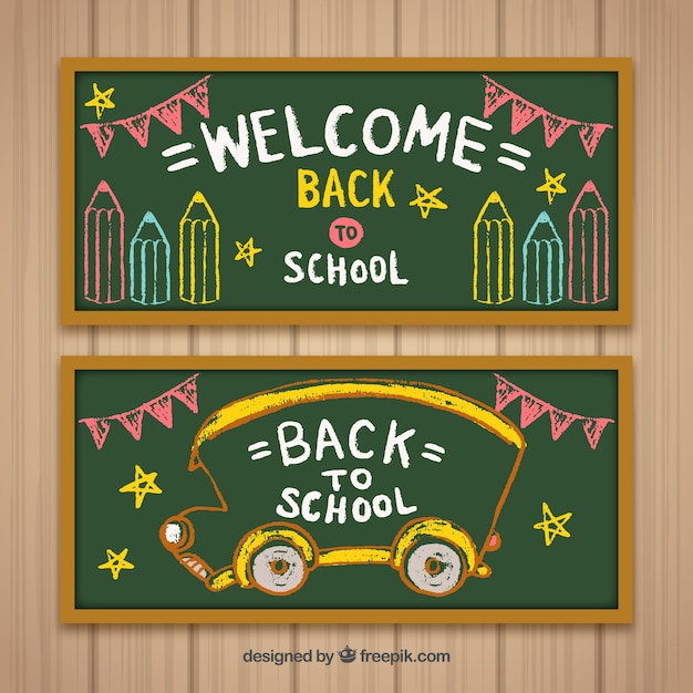 Vector blackboard with fun drawings of bus and pencils