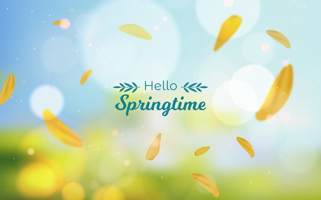 Free vector blurred background with hello springtime lettering